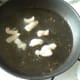 Scampi tails are quickly fried in bacon fat