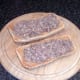 Mashed sardines are spread on bruschetta