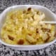 Gently fold the torn up bread into the casserole. Be sure to combine the ingredients well.