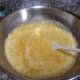 Fold in the 2 cans of crushed pineapple and combine the ingredients well.