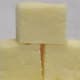 Squares cut from a pan of smooth candy.