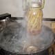 When the time is up, lift the lid away from you to keep the steam from burning you, then lifte each jar out with a jar lifter.