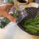 Pack beans into jars tightly, but without crushing them. Small, curly beans will naturally fit differntly than varieties that are long and straight. Both pickle well.