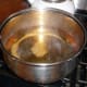 For the solution, for every four pints of pickles, mix in a pot: 2 1/2 cups vinegar, 2 1/2 cups water, 1/4 cup canning salt. Bring to a boil.