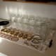 Check jars for nicks, cracks, and other problems. Wash in hot, soapy water. Scald if necessary. Wash lids and rings.