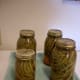 Place on a towel away from drafts, to cool for 8-12 hours. After that, check each seal, and refrigerate or re-process any jars that did not seal well. To check seals: Press in center of lid; if it pops back, it's not sealed. If it doesn't, remove the