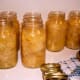 Wipe the rim of each jar with a clean, damp cloth, then screw on lids firmly (but not tightly).