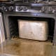This "roaster" is really an antique cookstove-top canner, designed to can 12 quarts at a time. It is aluminum, and will leach a funny taste to pumpkin which is left in it...so remove promptly.