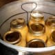 Place jars in canner rack.