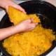 To remove pulp from pumpkins, use your thumb to scrape small sections from the rind. Bits of rind in the pulp can be picked out later, when you pack your jars.
