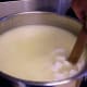 Stir the curds gently.