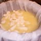 Here are curds and whey in the process of draining.