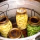 Place jars in rack in your gently heating pressure canner.