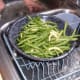 Drain them for a few minutes. It is best to prepare no more beans than you can put in your canner at one time.