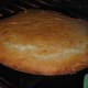 The foundation of a pineapple upside-down cake is a beautiful yellow cake base. It should puff and turn golden brown.