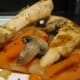 Chicken, onions, mushrooms, and carrots.