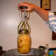Carefully lift out jars with a jar lifter...