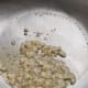 Saute Garlic in Small Amount of Oil Over Low Heat.