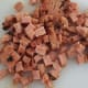 Dice the Slices of Embutido to Blend Easily with the Fried Rice.