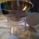 Funnel in jar with ladle