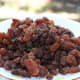 A plate full of juicy, sweet sultanas.