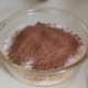 Mix all of the dry ingredients together: soft icing sugar, coconut, cocoa, and Rice Bubbles.