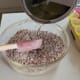 Melt the Copha in a saucepan on the stove. Then pour the melted Copha into the dry mixture. Mix thoroughly.