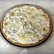 Mixture spooned into the graham cracker crust and smoothed even. Time to cover and refrigerate this banana split pie