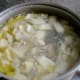 Tinolang Manok Simmering on the Stove