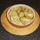 Potato and onion slices removed from the oven