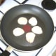 Sear the scallops in a separate frying pan
