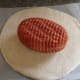 Wrap ham in rolled-out dough
