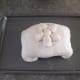 Place wrapped ham seams down on cookie sheet and use leftover dough for decoration.