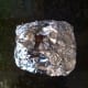 Fold up the tinfoil so it looks like a chimney.