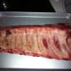 Ribs liberally seasoned.