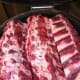 Place the meat on the grill bone side down.