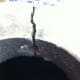 We wore plastic glove, put the support back in place, and then filled the cracks with the cement.