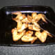 Cooking tongs are the best tool for lifting the chicken wings to the serving plate