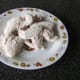 The chicken wings are firstly shaken in the flour