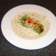 Assemble the shrimp and pineapple seafood salad wrap.