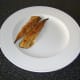 Smoked mackerel fillets are firstly laid on a plate