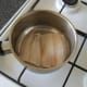 Cut your whiting fillet in half and lay it in the bottom of a pot or saucepan
