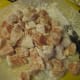 1. Cut up chicken. Pour on cornstarch and mix until all the pieces are coated.
