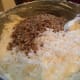 Pecans and coconut flakes added to the batter for Italian Cream Cake.
