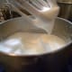 If the beaten egg whites form stiff peaks when the beaters are removed from them, the whites are ready to go into the cake.
