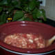 Stir the turkey, tomatoes, and beans together.