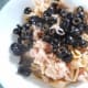 Add the sliced black olives