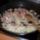 Gently fry the bacon and onions in oil