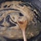 Gently fry the flour in the oil