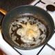 Floured quail is browned in butter